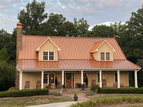 copper penny metal roof on white house|copper color metal roofing cost.